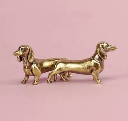 Set of 5 miniature gold dachshund statues