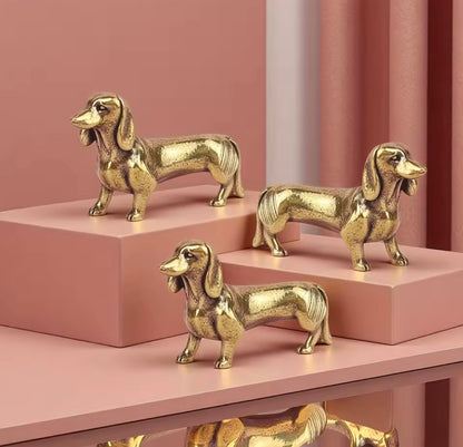 Set of 5 miniature gold dachshund statues